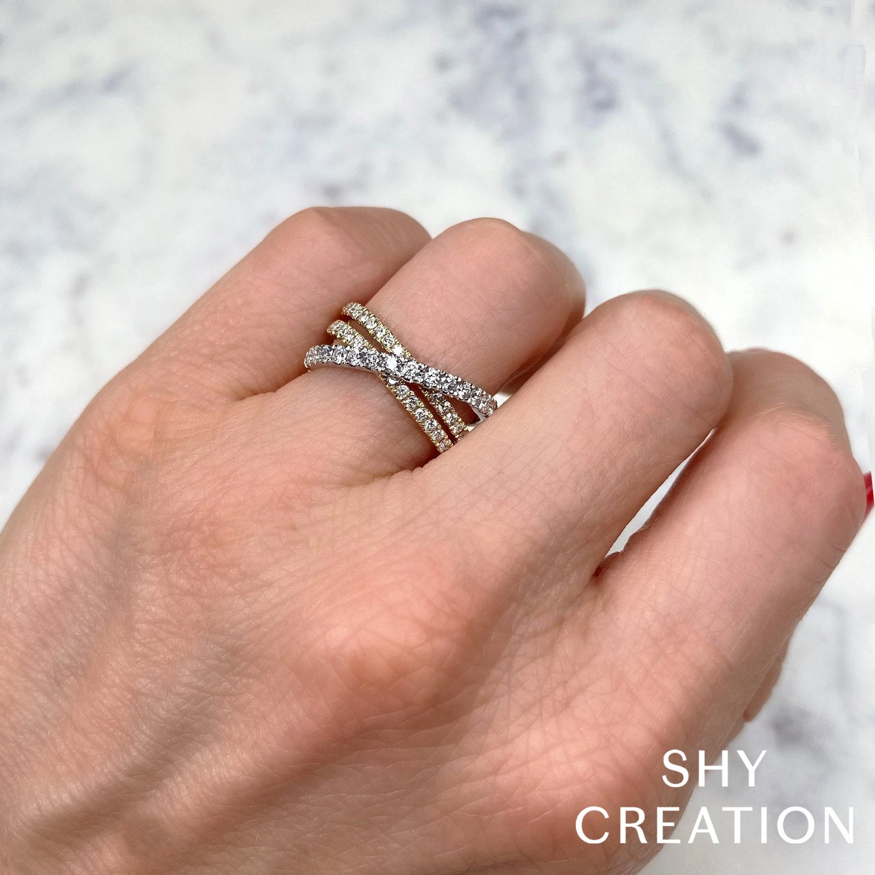0.79CT DIAMOND BRIDGE RING SC55024862