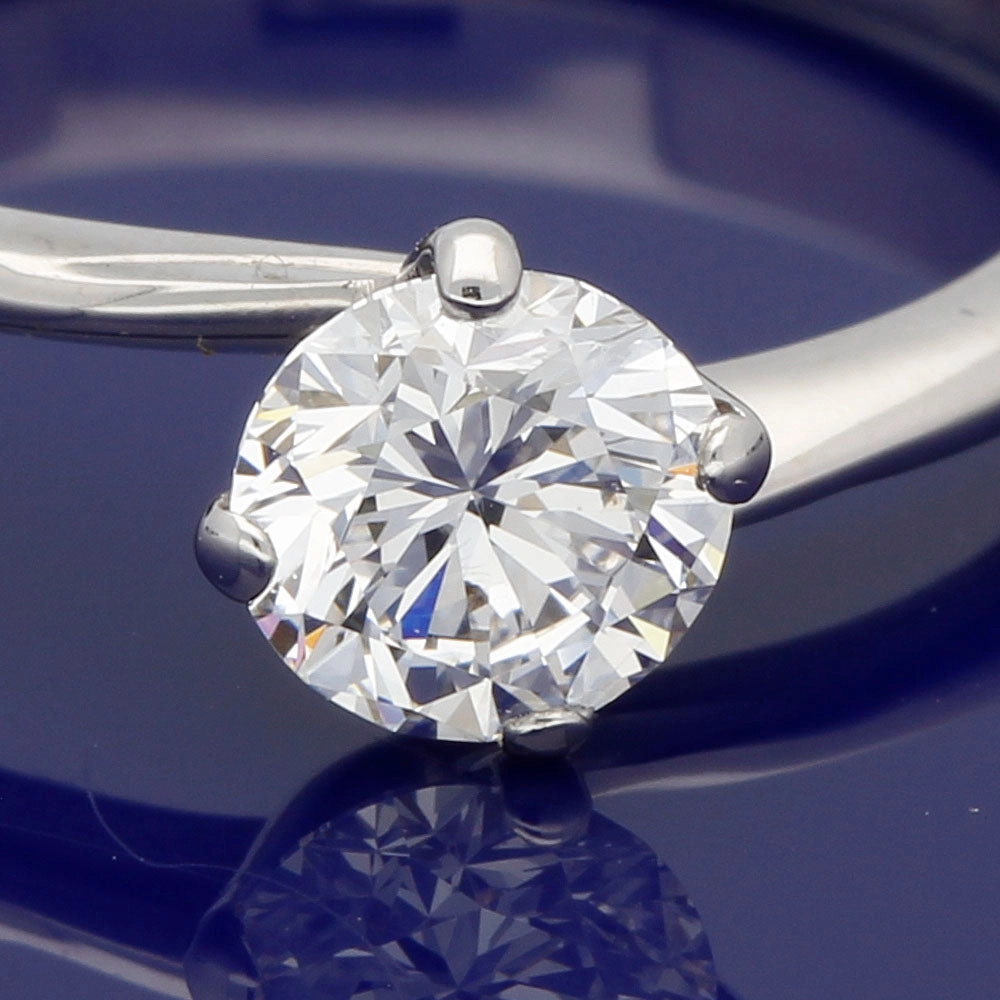 18ct White Gold Certificated 0.59ct Diamond Solitaire Twist Ring D/VVS1