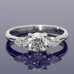 18ct White Gold Certificated 0.90ct Diamond Trilogy Ring with Pear Shape Diamond Set Shoulders