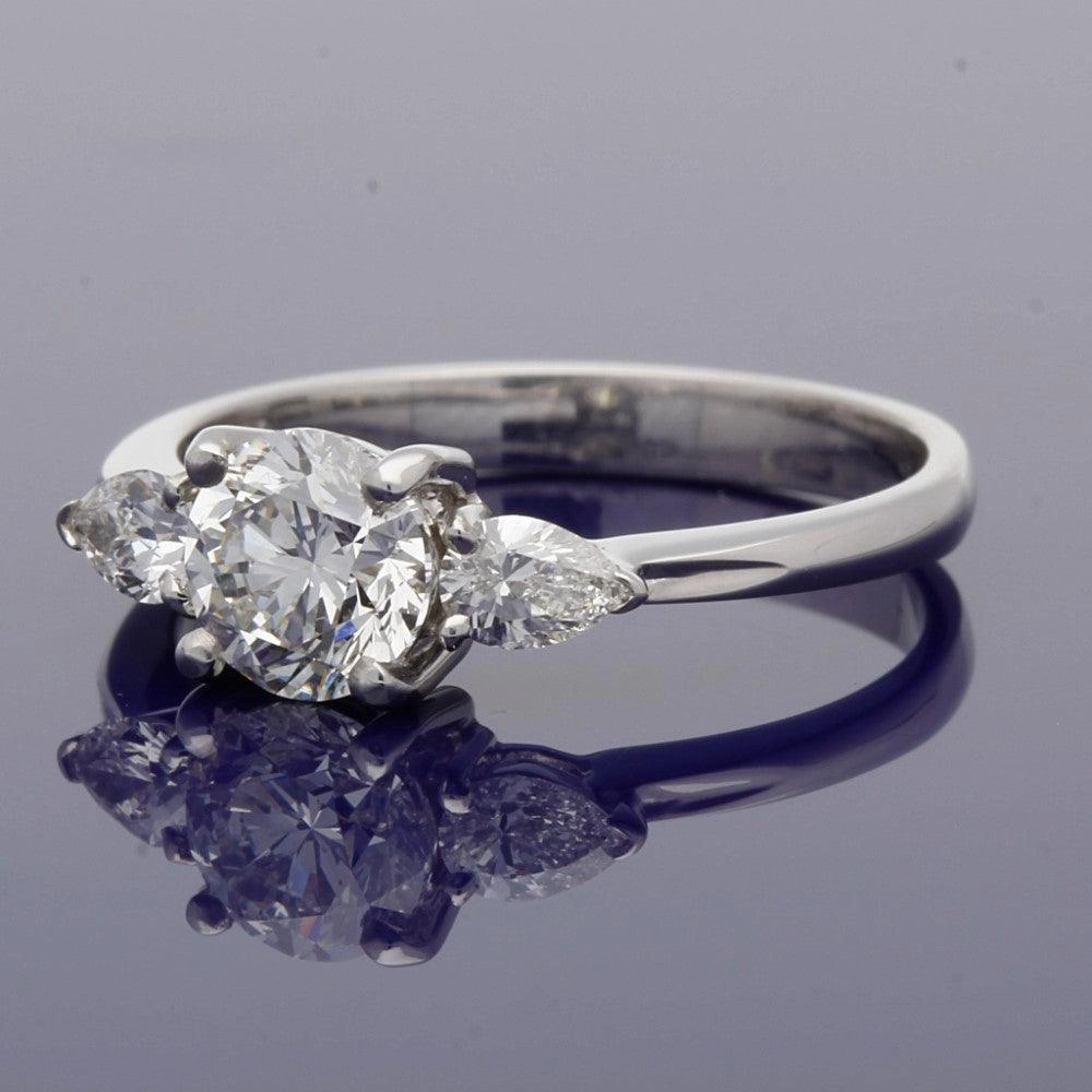 18ct White Gold Certificated 0.90ct Diamond Trilogy Ring with Pear Shape Diamond Set Shoulders
