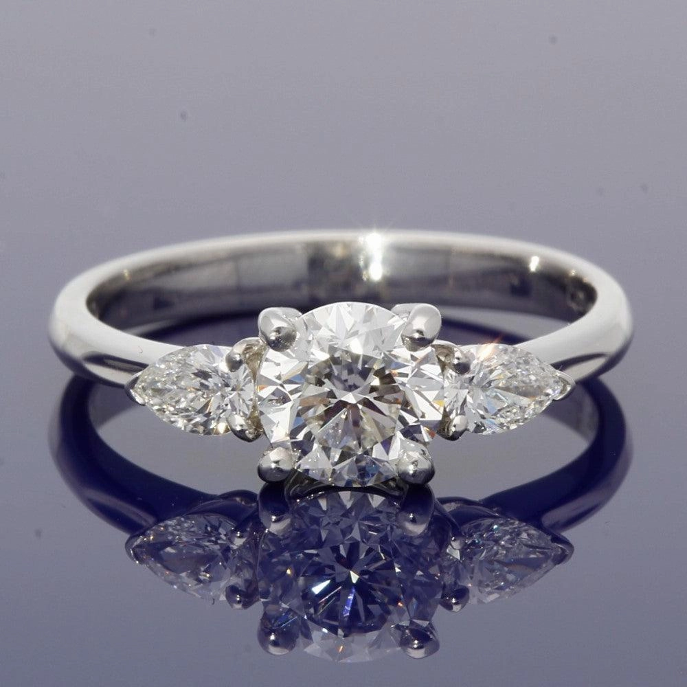 18ct White Gold Certificated 0.90ct Diamond Trilogy Ring with Pear Shape Diamond Set Shoulders