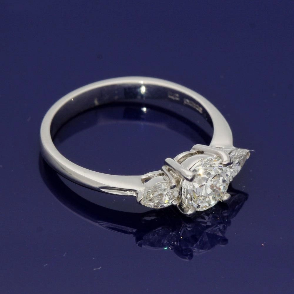 18ct White Gold Certificated 0.90ct Diamond Trilogy Ring with Pear Shape Diamond Set Shoulders