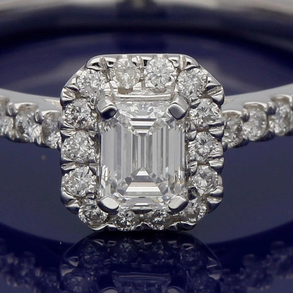18ct White Gold Certificated Emerald Cut Diamond Halo Ring
