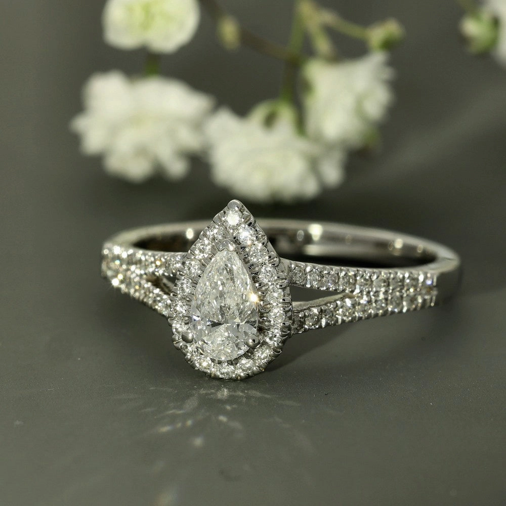 18ct White Gold Certificated Pear Cut Diamond Halo Ring