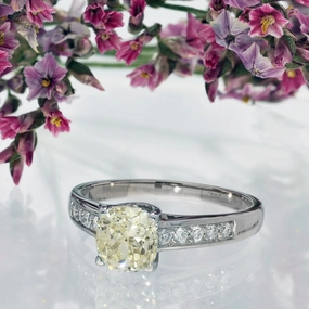 18ct White Gold Natural Yellow Diamond Solitaire with Diamond Set Shoulders