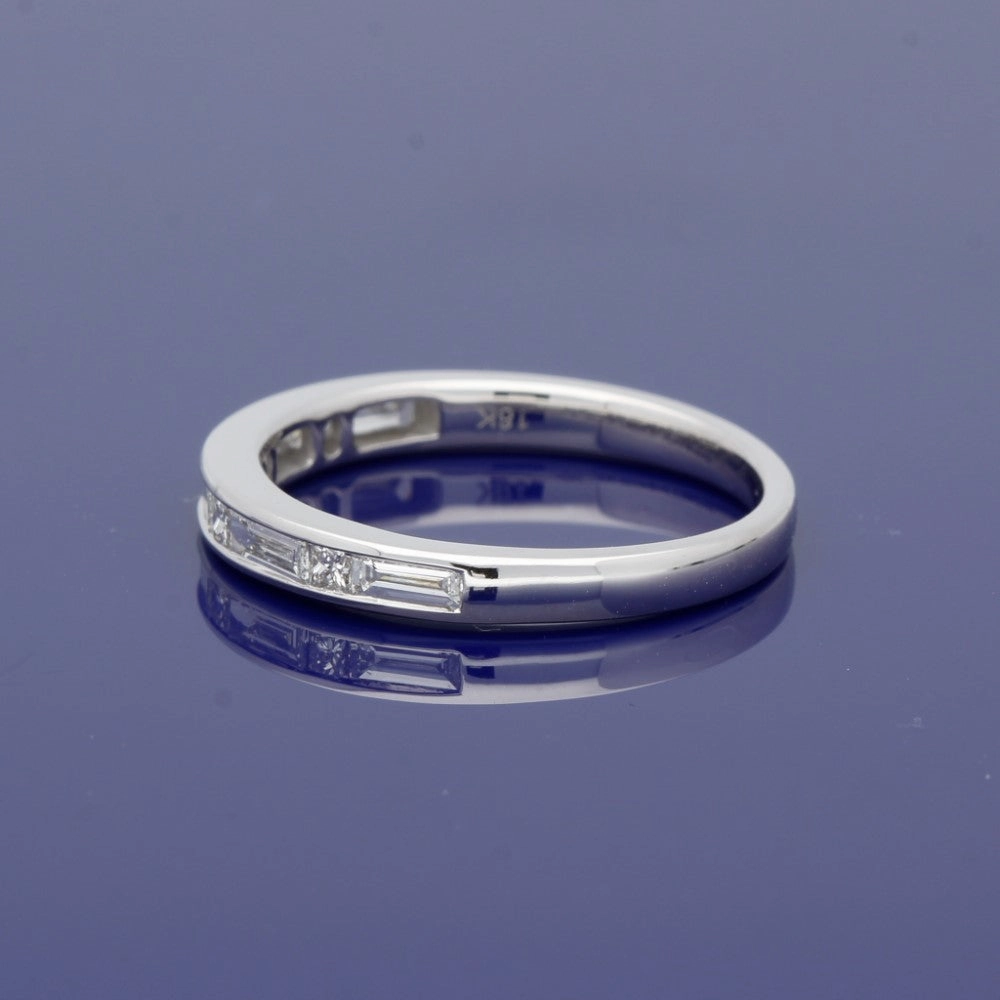 18ct White Gold Princess and Baguette Cut Diamond Half Eternity Ring