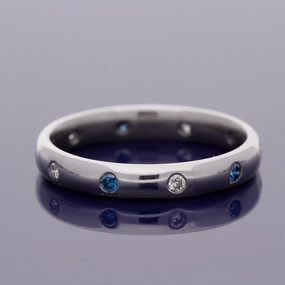 18ct White Gold Sapphire & Diamond Roman Set Eternity Ring