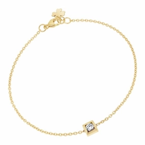 Bracelet en or jaune serti d'un diamant.