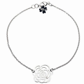 Bracelet fleur en or blanc serti d'un diamant.