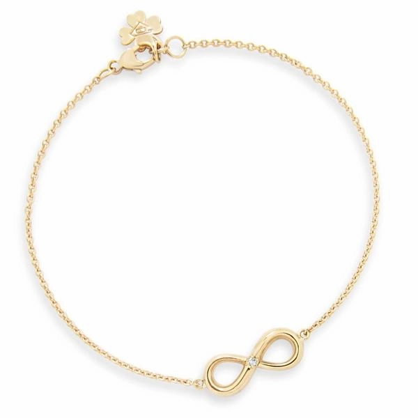 Bracelet Infinity en or jaune serti d'un diamant.