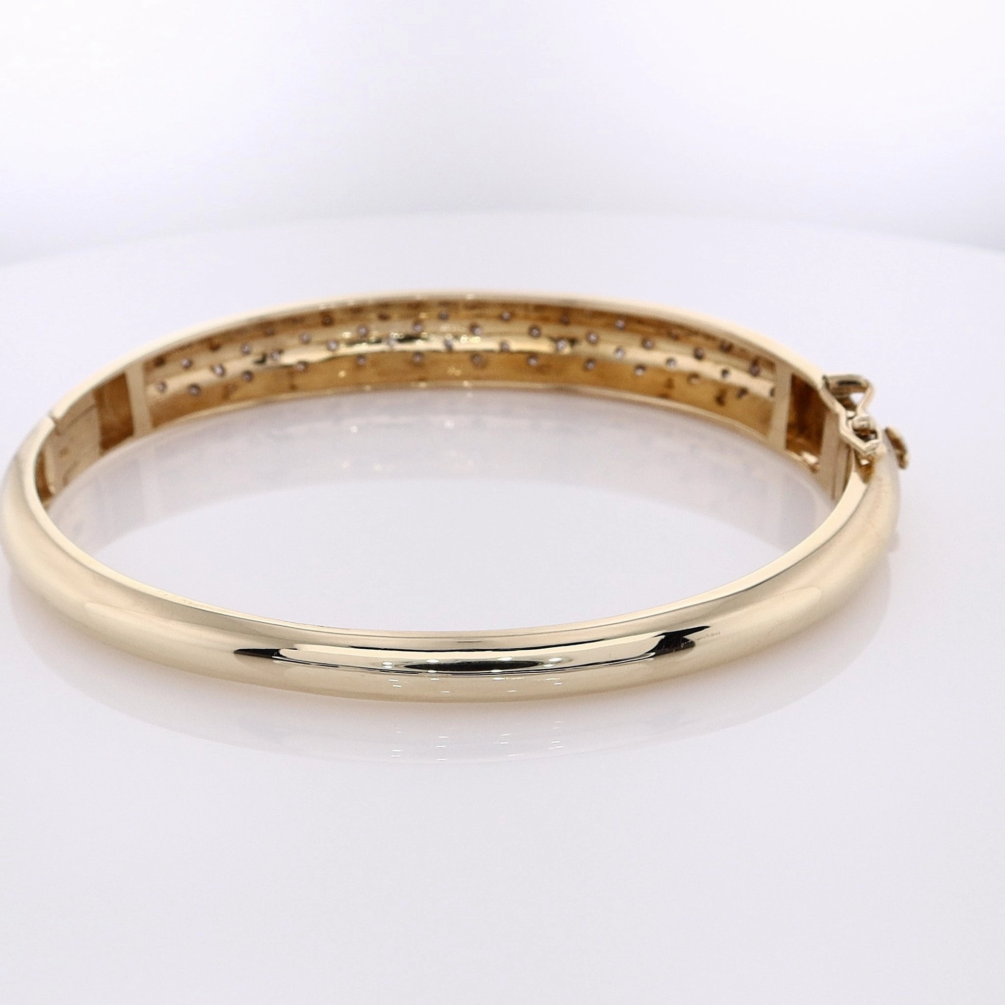 Estate 14 Karat White and Yellow Gold Hinged Diamond Bangle Bracelet