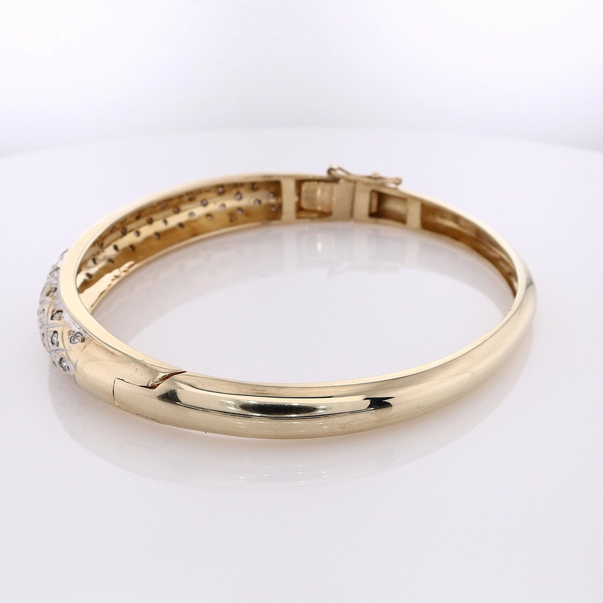 Estate 14 Karat White and Yellow Gold Hinged Diamond Bangle Bracelet
