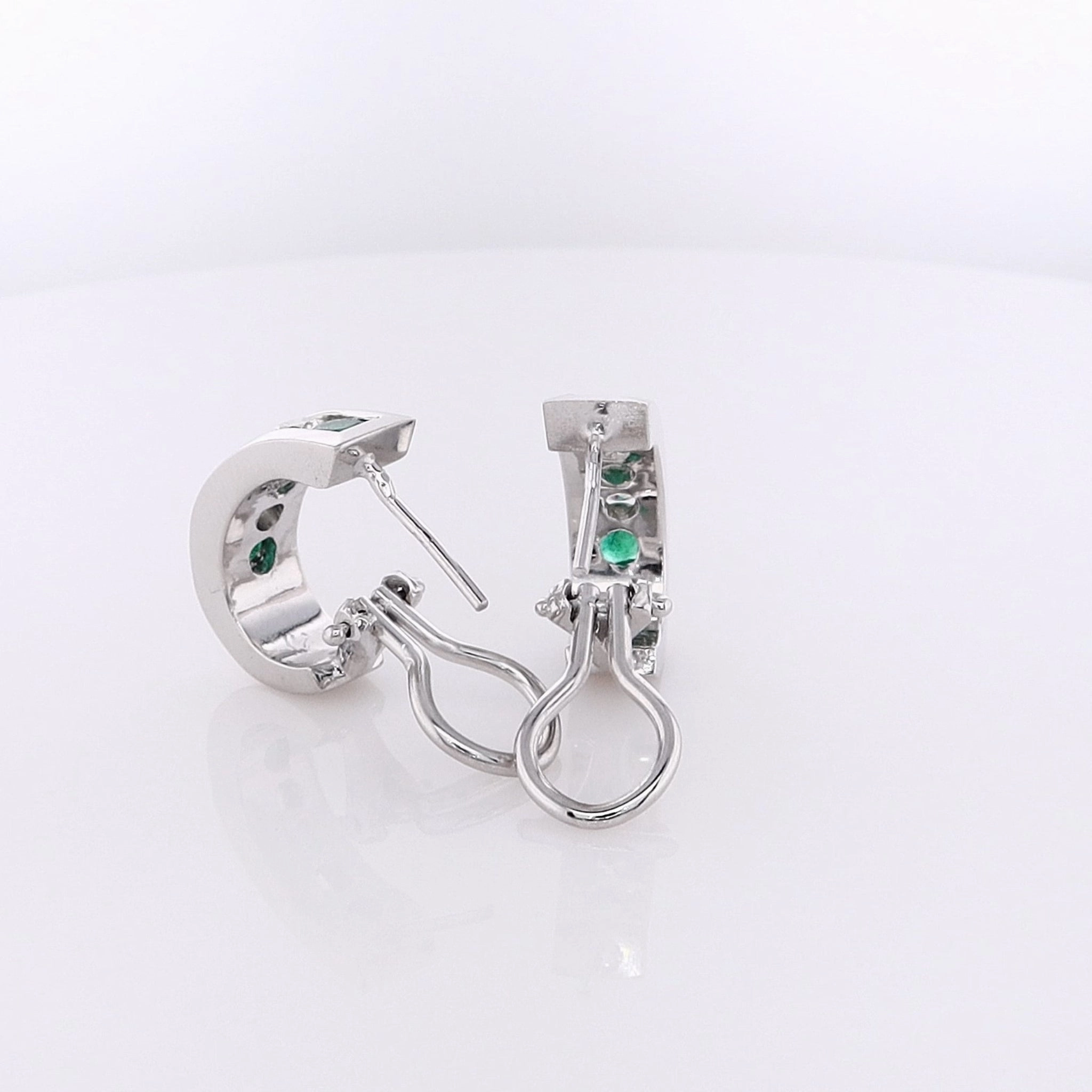 Estate 14 Karat White Gold Diamond and Emerald Omega Backed Hoop Earrings