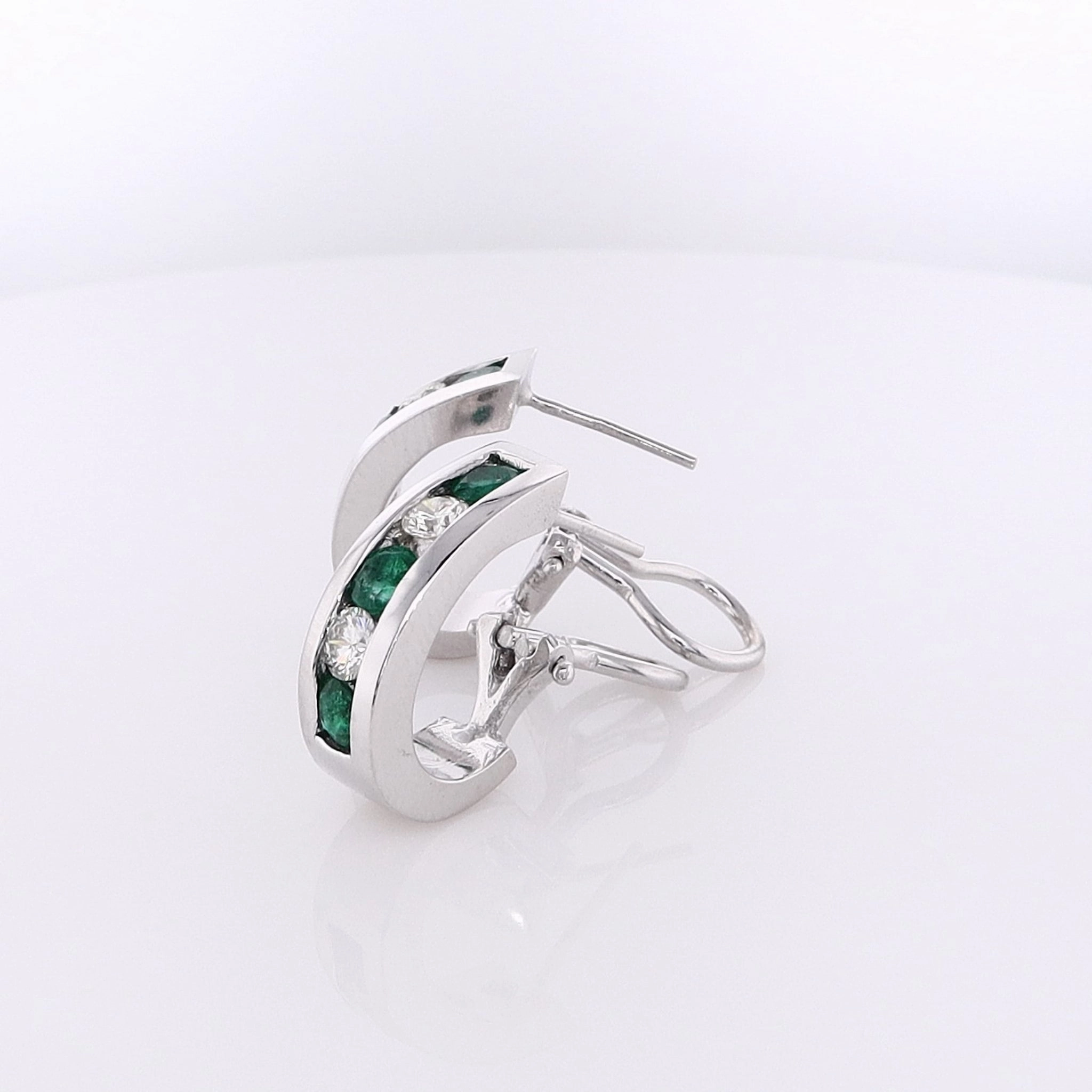 Estate 14 Karat White Gold Diamond and Emerald Omega Backed Hoop Earrings