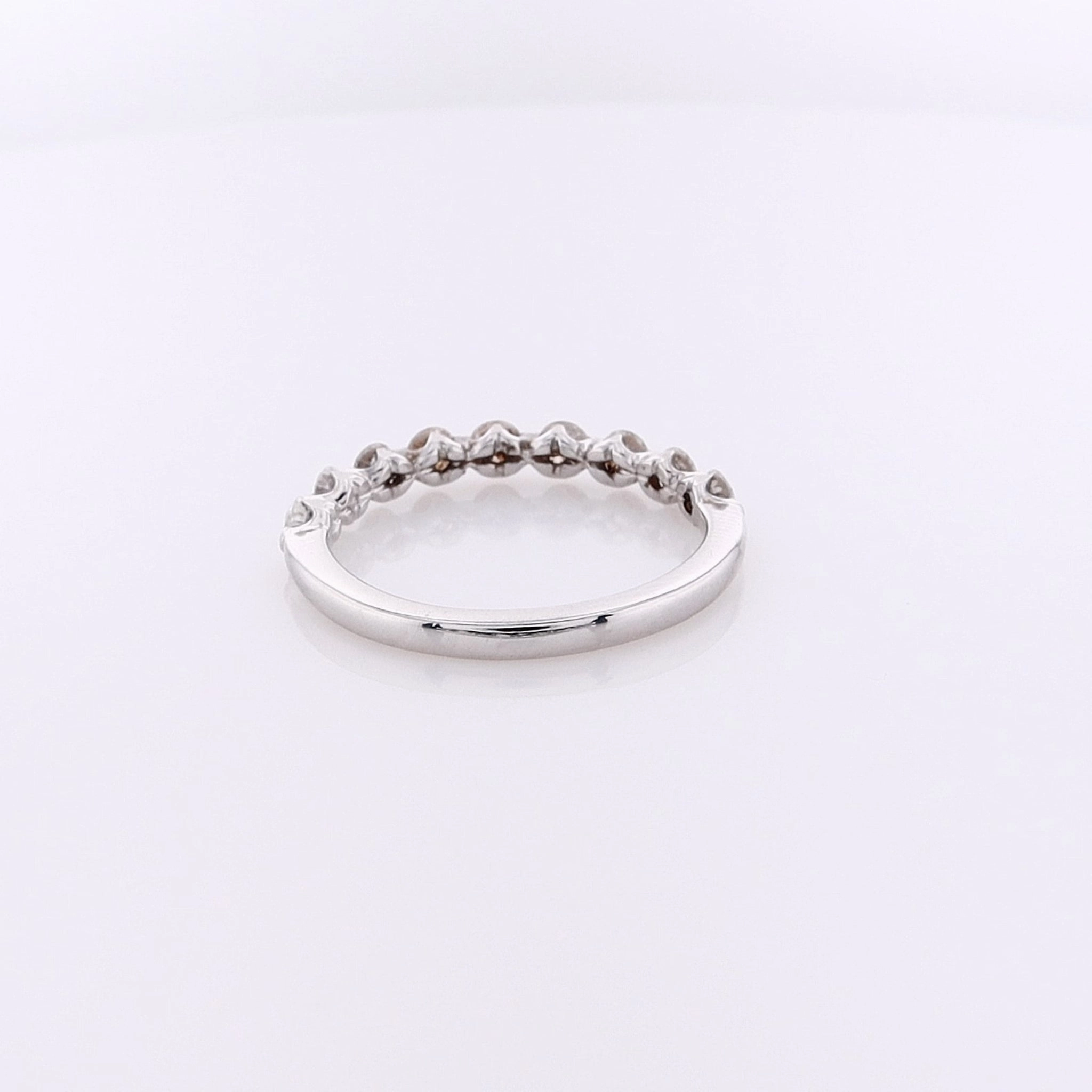 Estate 14 Karat White Gold Shared Prong Diamond Wedding Band