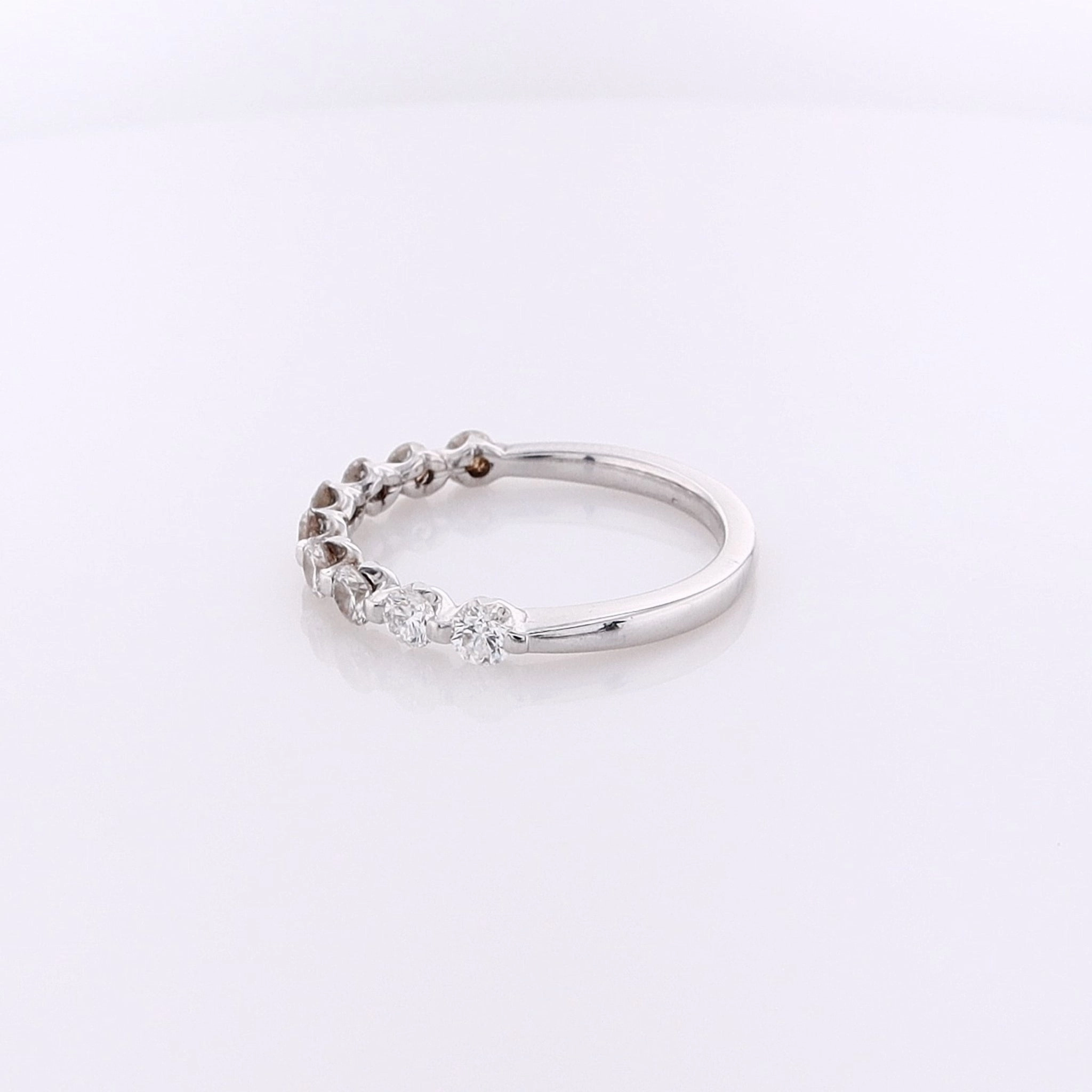 Estate 14 Karat White Gold Shared Prong Diamond Wedding Band