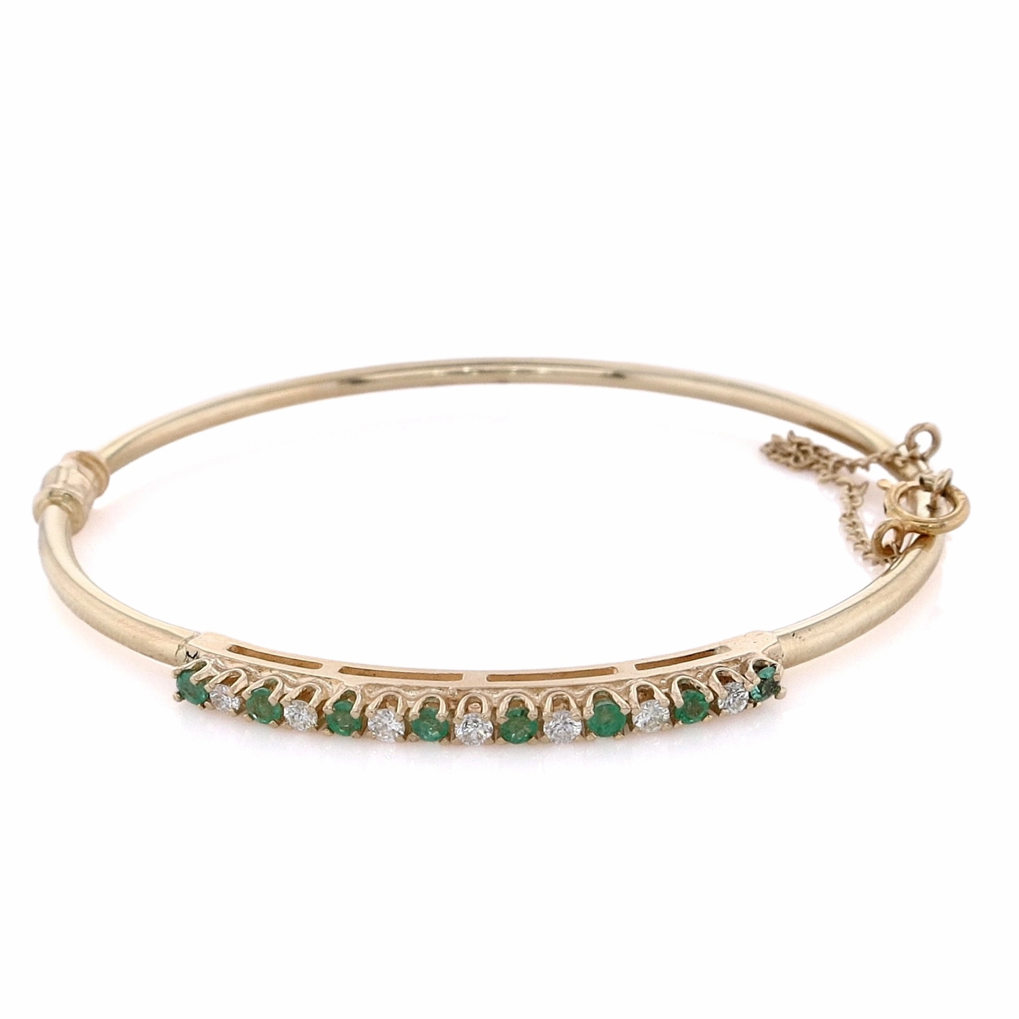 Estate 14 Karat Yellow Gold Diamond and Emerald Bangle Hinged 7 RBC D.21tw HSI Alternating 8 Round Emeralds .24tw Prong Set
