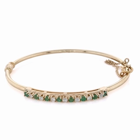 Estate 14 Karat Yellow Gold Diamond and Emerald Bangle Hinged 7 RBC D.21tw HSI Alternating 8 Round Emeralds .24tw Prong Set