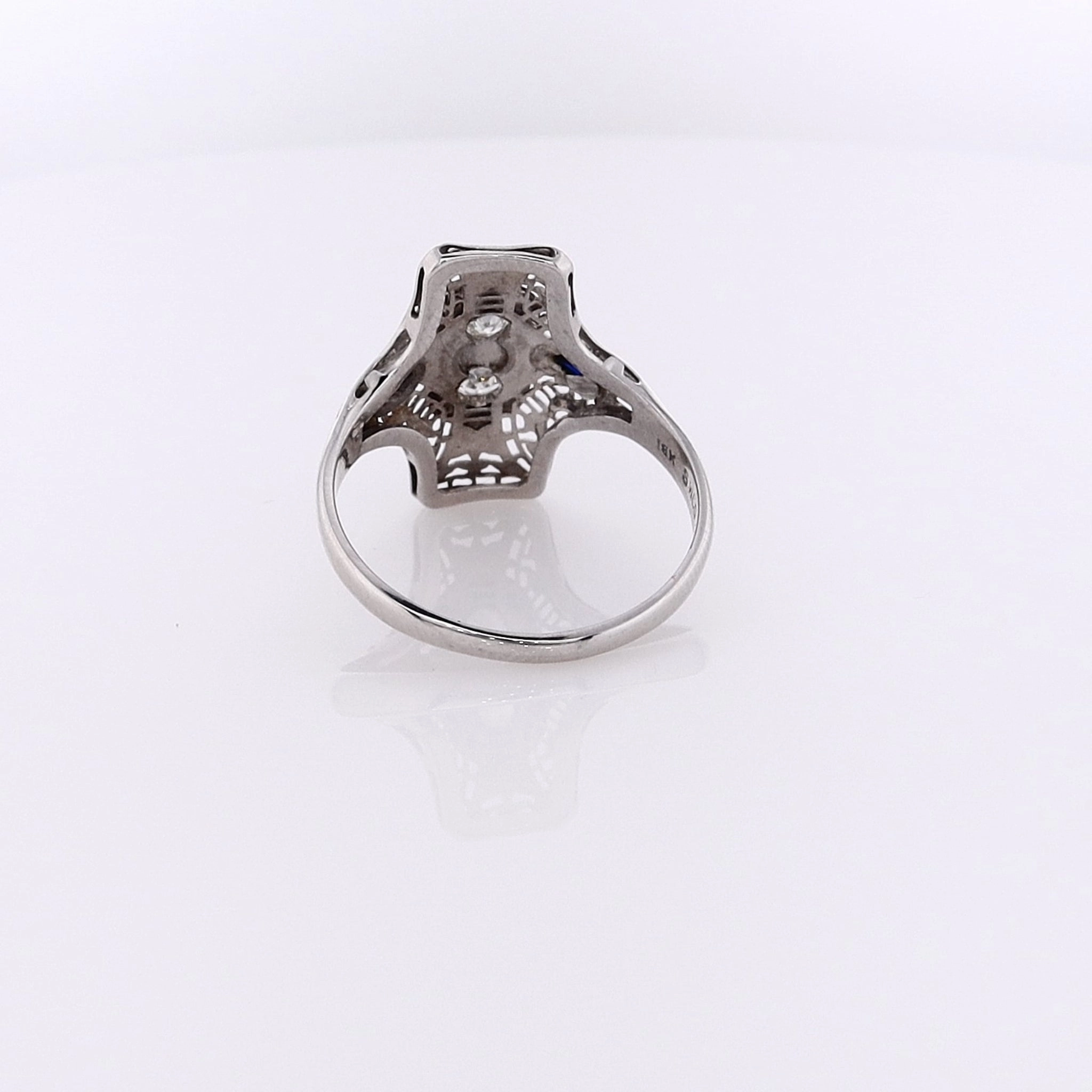 Estate 18 Karat White Gold Filigree Diamond and Sapphire Ring
