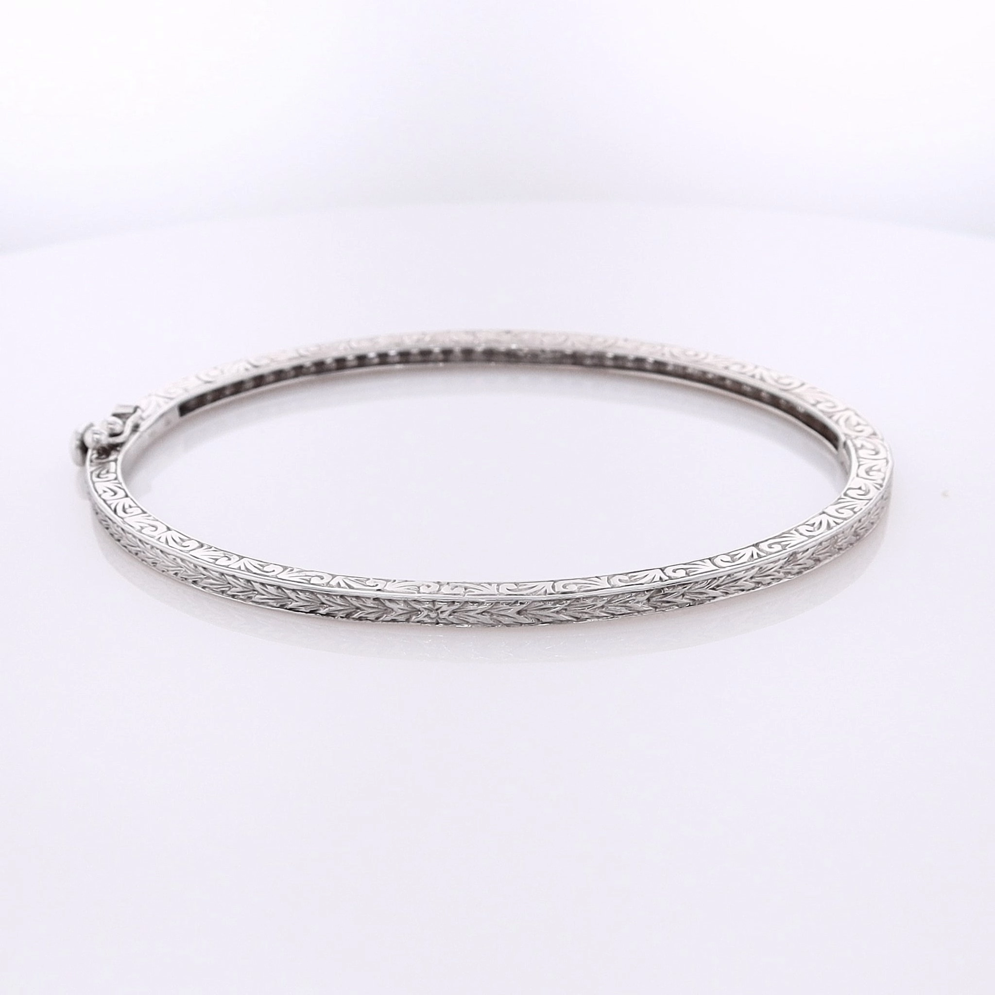 Estate 18 Karat White Gold Hinged Diamond Bangle Bracelet With Milgrain Design