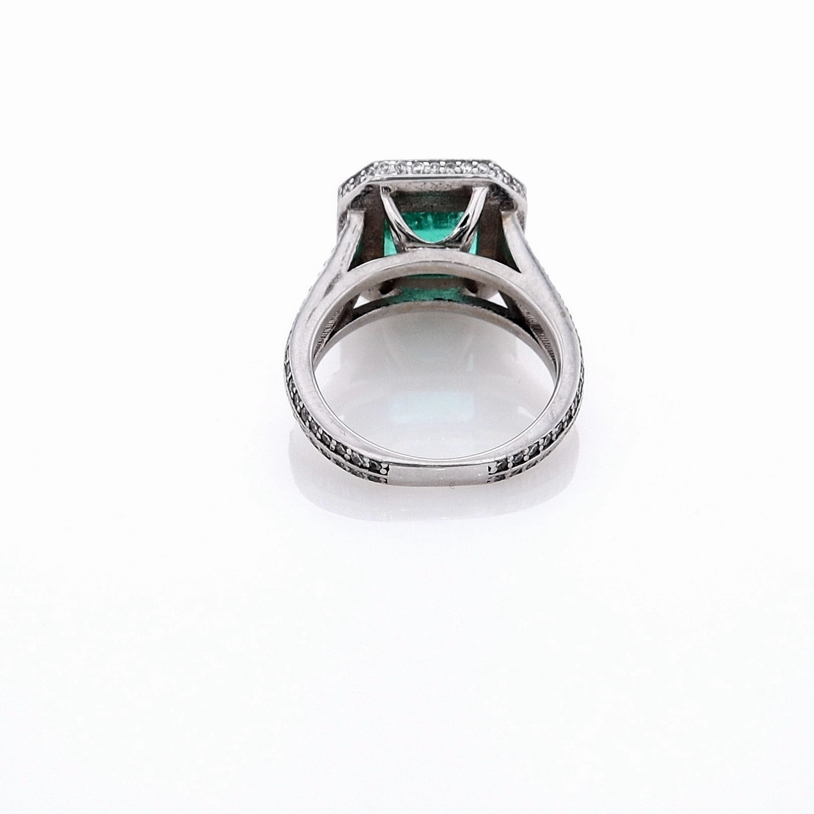 Estate Jewelery 18k White Gold Emerald and Diamond Halo Split Shank Ring