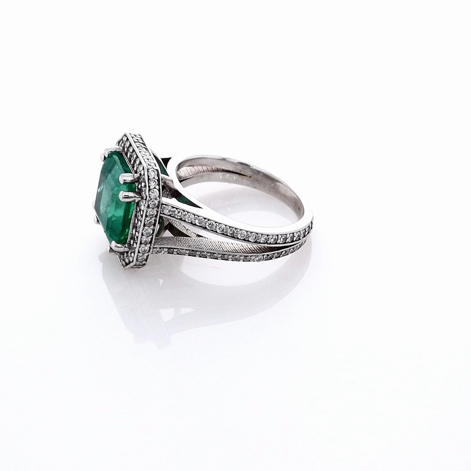 Estate Jewelery 18k White Gold Emerald and Diamond Halo Split Shank Ring