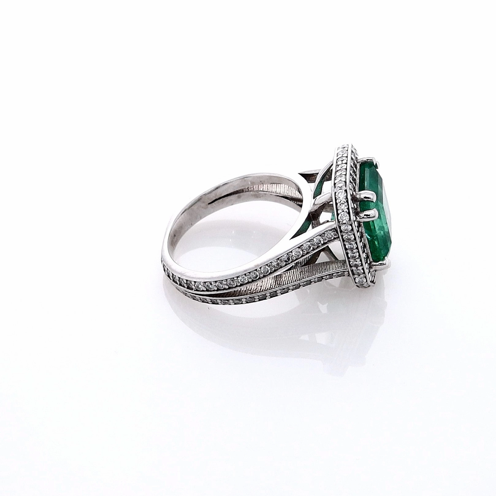 Estate Jewelery 18k White Gold Emerald and Diamond Halo Split Shank Ring