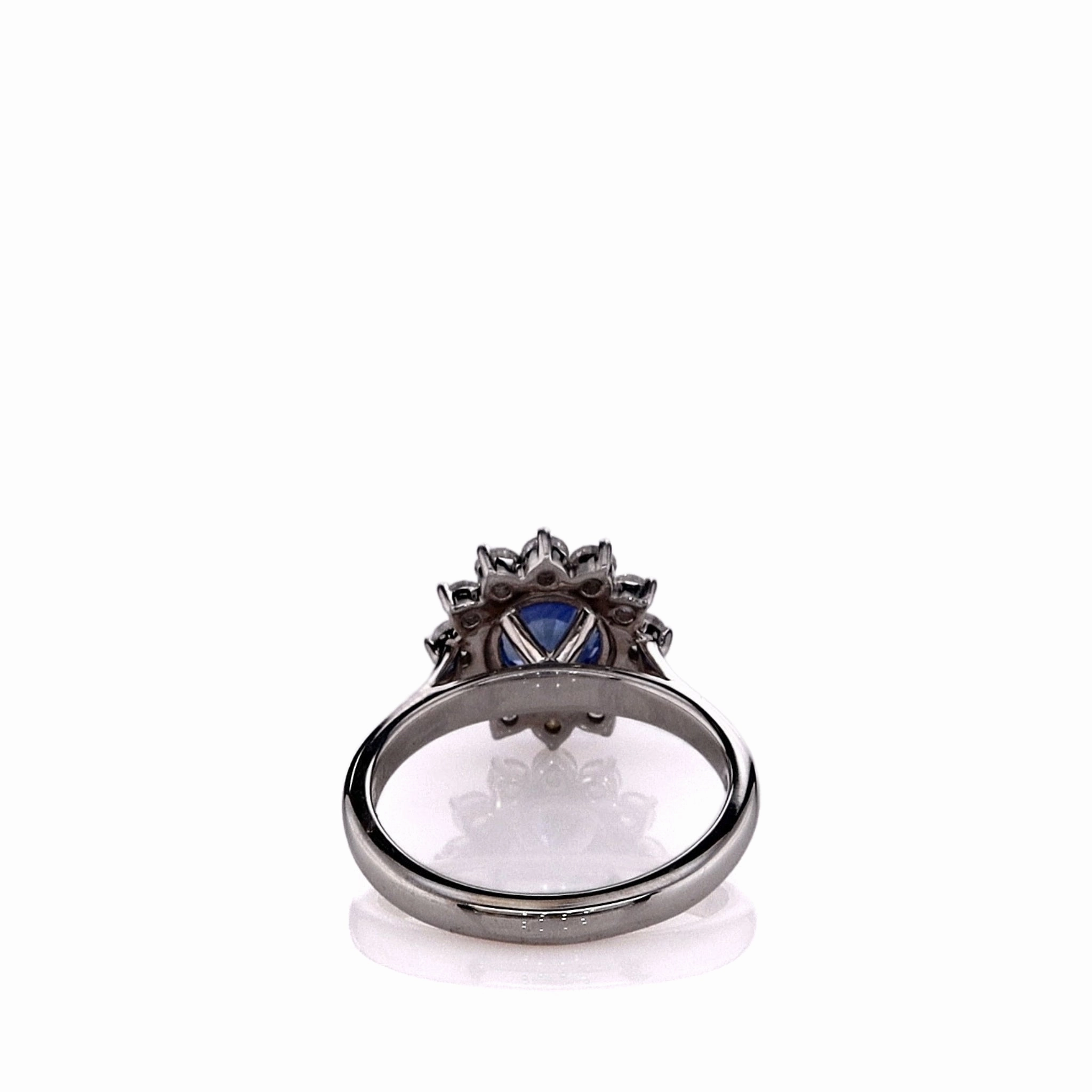Estate Martin Flyer 14k White Gold Round Sapphire and Diamond Halo Ring