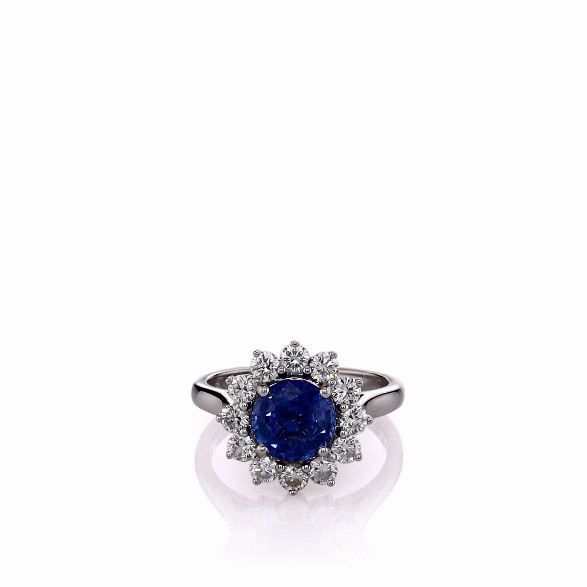 Estate Martin Flyer 14k White Gold Round Sapphire and Diamond Halo Ring