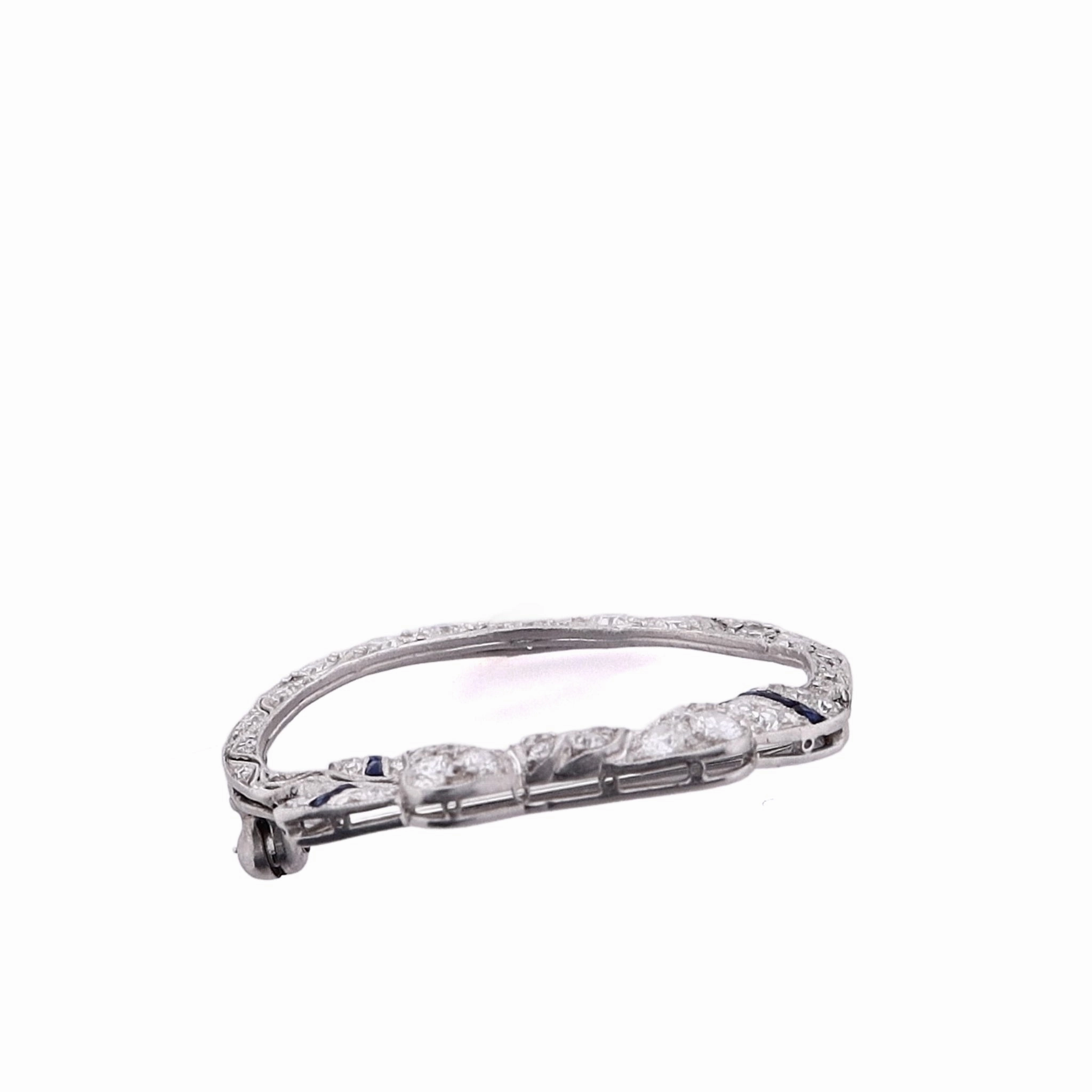 Estate Platinum Bow Design Diamond and Synthetic Sapphire Circle Pin