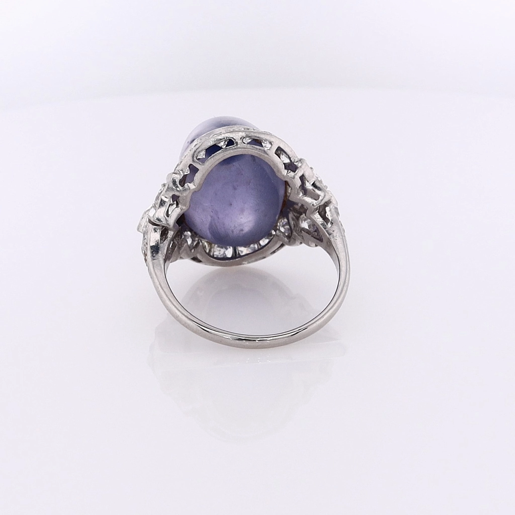Estate Platinum Star Sapphire and Diamond Halo Ring
