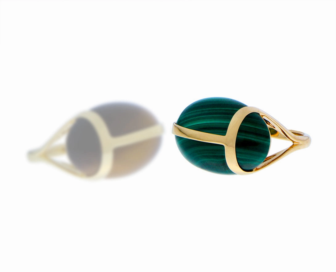 Gold ring with a malachite or tiger eye scarab