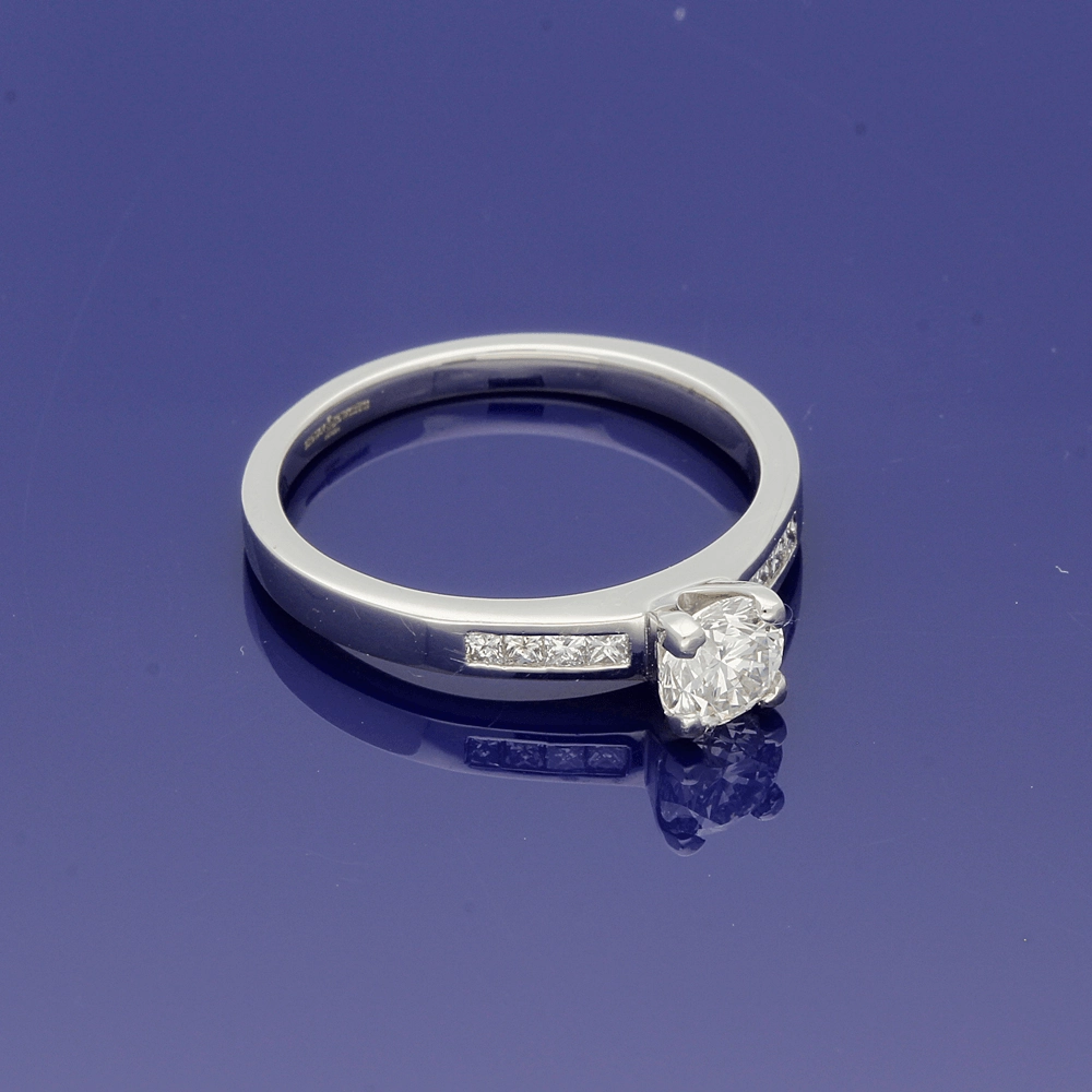 Platinum 0.50ct Diamond Solitaire Engagement Ring with Diamond Shoulders