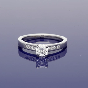 Platinum 0.50ct Diamond Solitaire Engagement Ring with Diamond Shoulders
