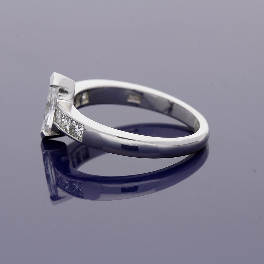 Platinum 0.51ct Marquise Cut Diamond Solitaire Ring with Princess Cut Diamond Set Shoulders