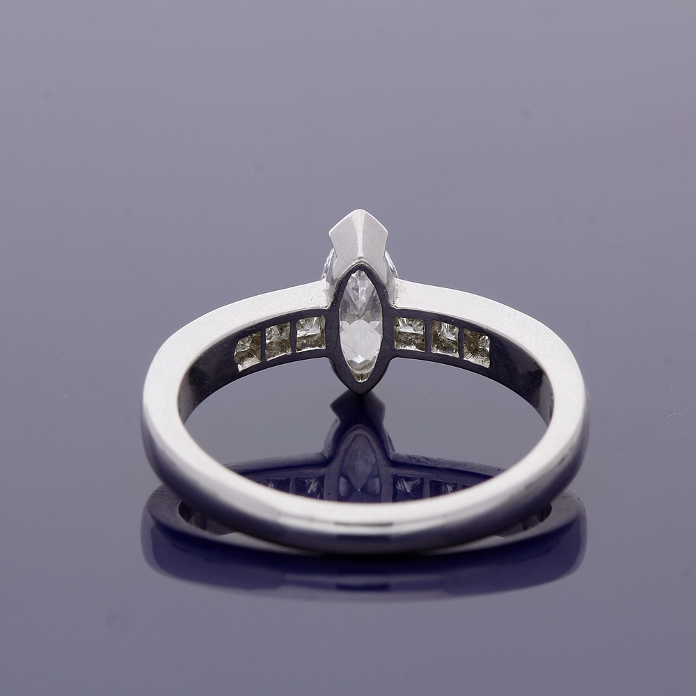 Platinum 0.51ct Marquise Cut Diamond Solitaire Ring with Princess Cut Diamond Set Shoulders