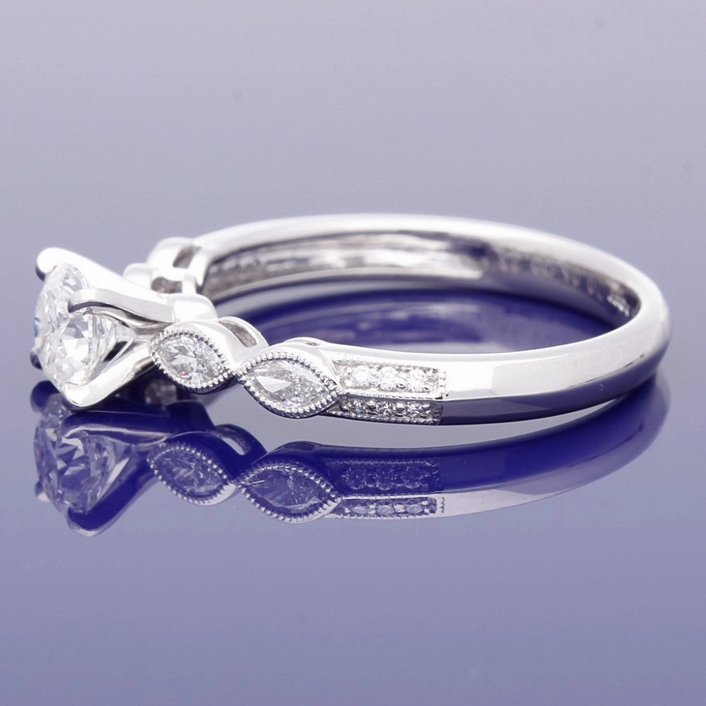Platinum 0.56ct Solitaire with Diamond Set Shoulders Ring