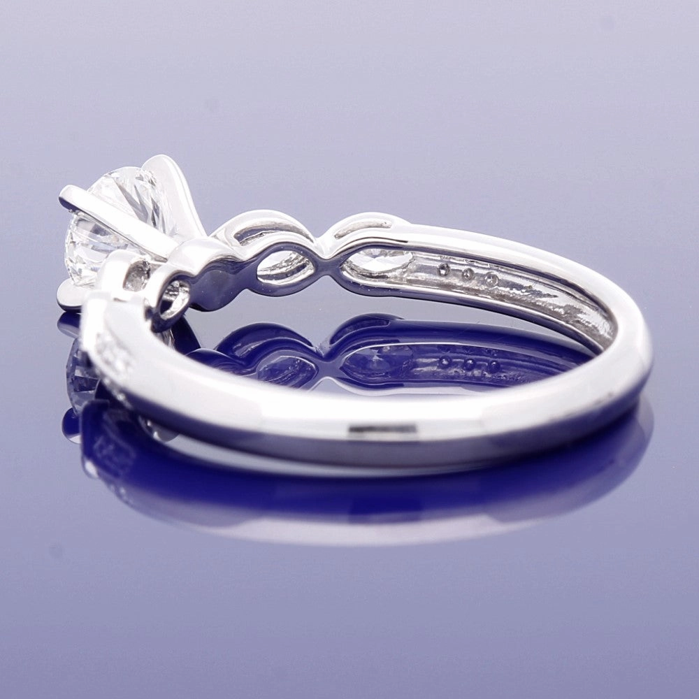 Platinum 0.56ct Solitaire with Diamond Set Shoulders Ring