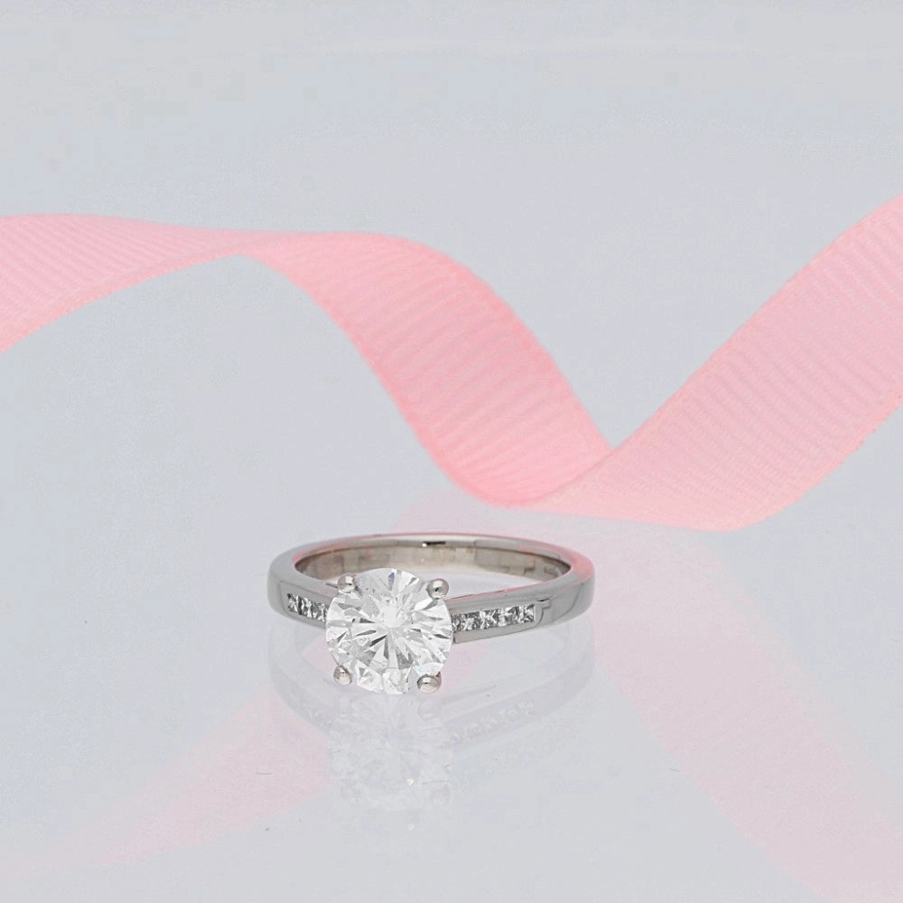 Platinum 1.50ct Round Diamond & Princess Cut Diamond Set Shoulders Ring