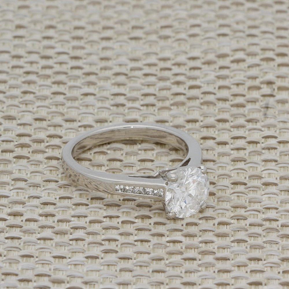 Platinum 1.50ct Round Diamond & Princess Cut Diamond Set Shoulders Ring
