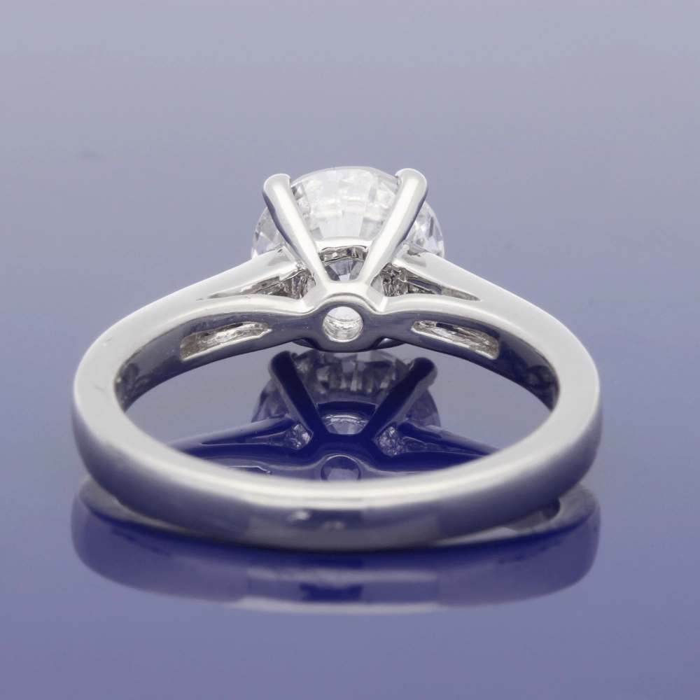 Platinum 1.50ct Round Diamond & Princess Cut Diamond Set Shoulders Ring
