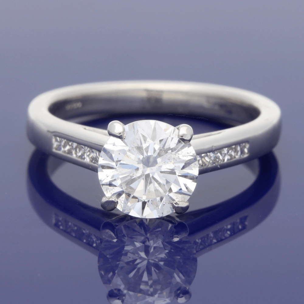 Platinum 1.50ct Round Diamond & Princess Cut Diamond Set Shoulders Ring