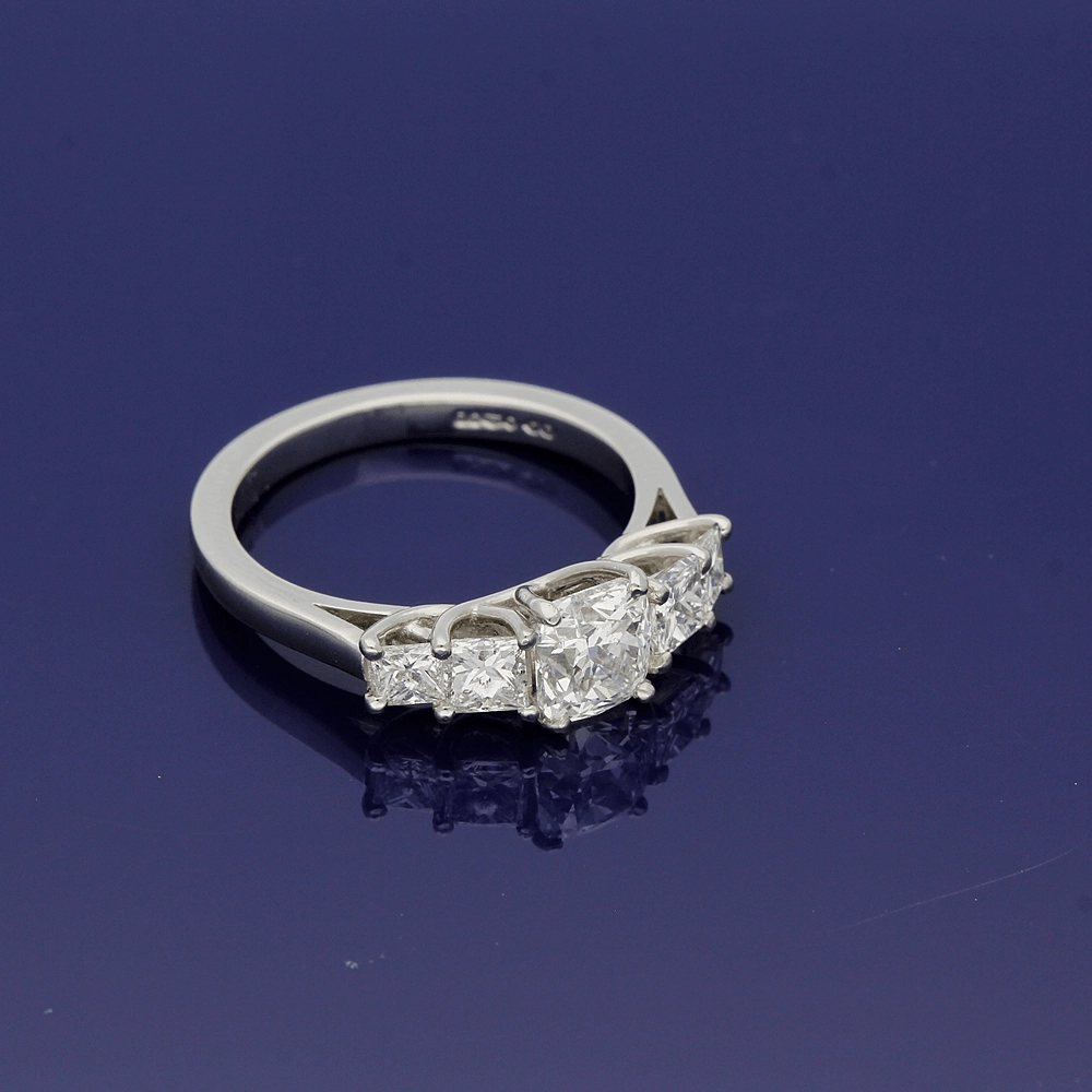 Platinum 5-Stone Ring with Cushion Cut and Princess Cut Diamonds