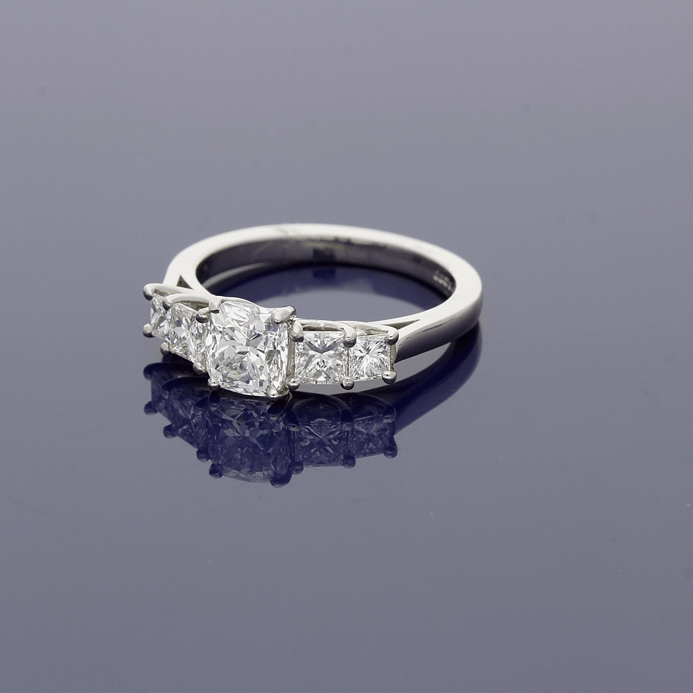Platinum 5-Stone Ring with Cushion Cut and Princess Cut Diamonds