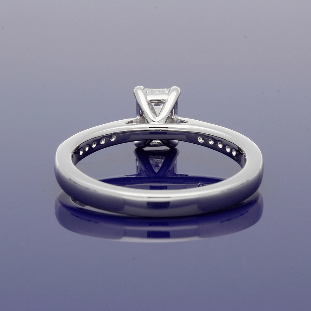 Platinum Certificated 0.53ct Emerald Cut Solitaire Ring with Diamond Shoulders