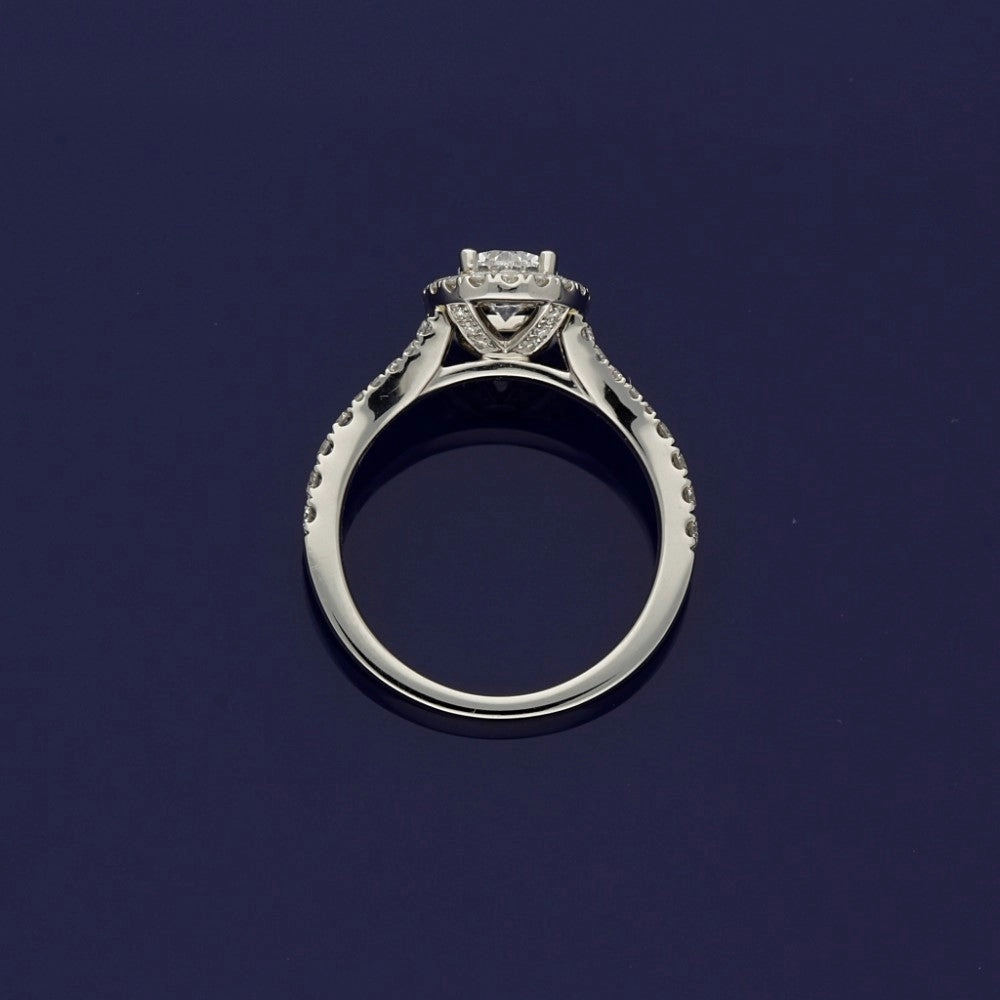 Platinum Certificated Oval Cut Diamond Halo Ring with Diamond Set Shoulders