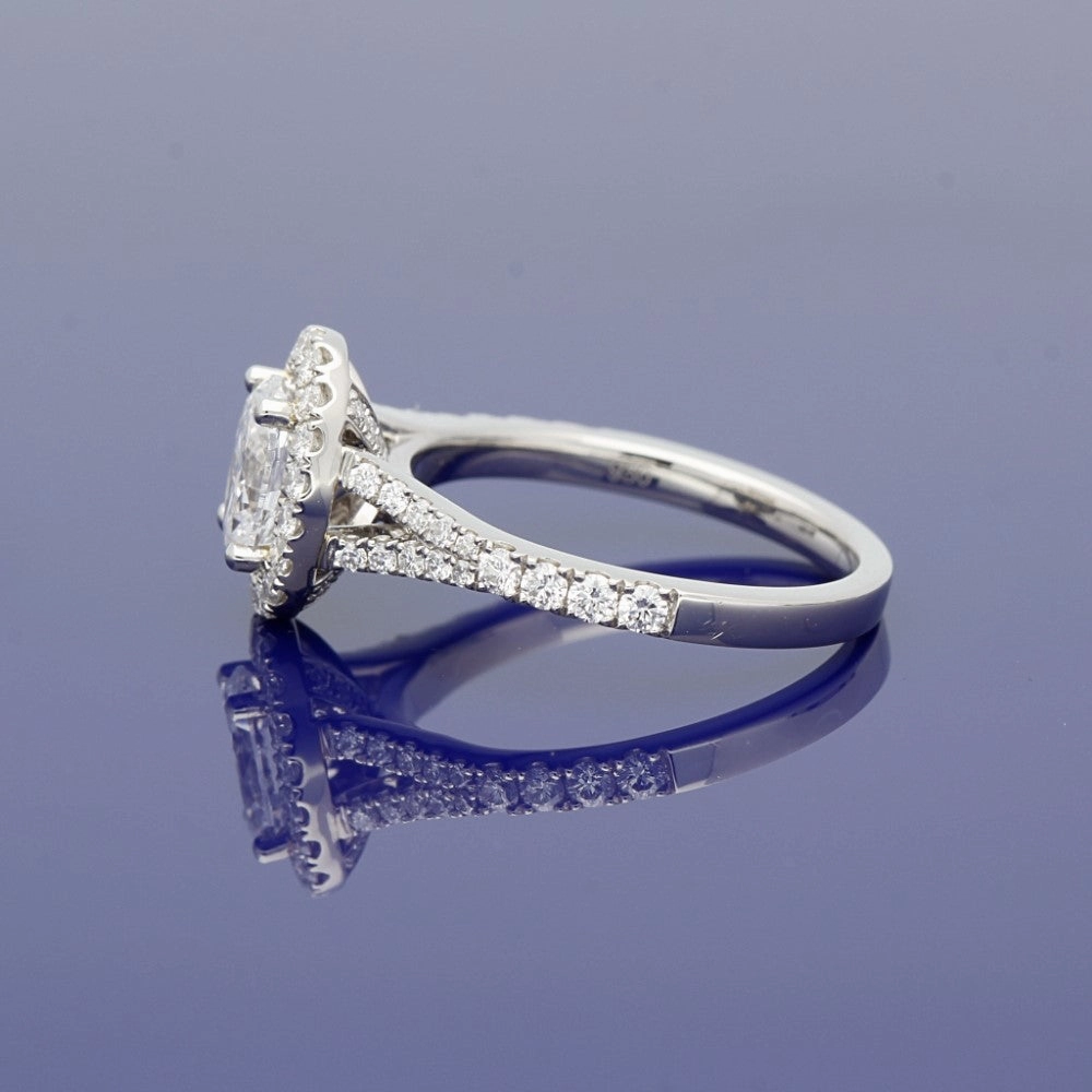Platinum Certificated Oval Cut Diamond Halo Ring with Diamond Set Shoulders