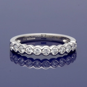 Platinum Diamond Bezel Set Half Eternity Ring