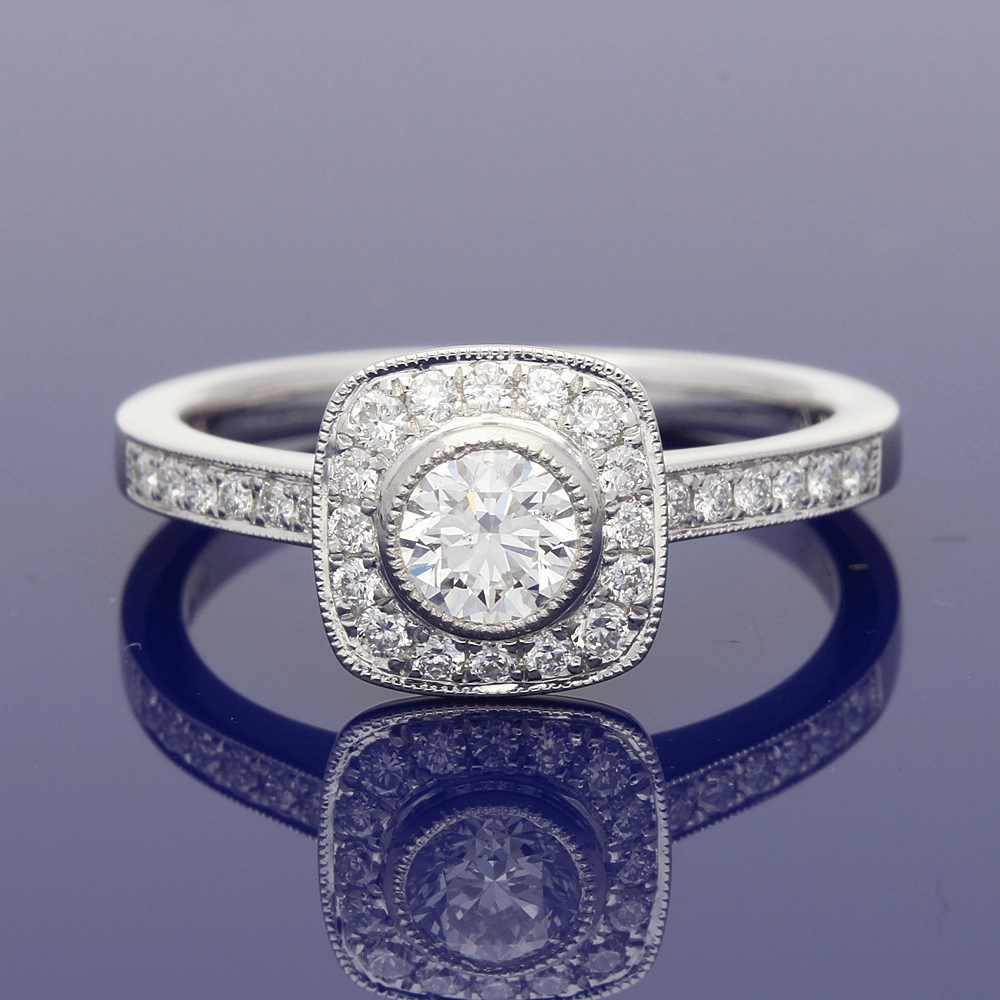 Platinum Diamond Halo Ring with Diamond Set Shoulders