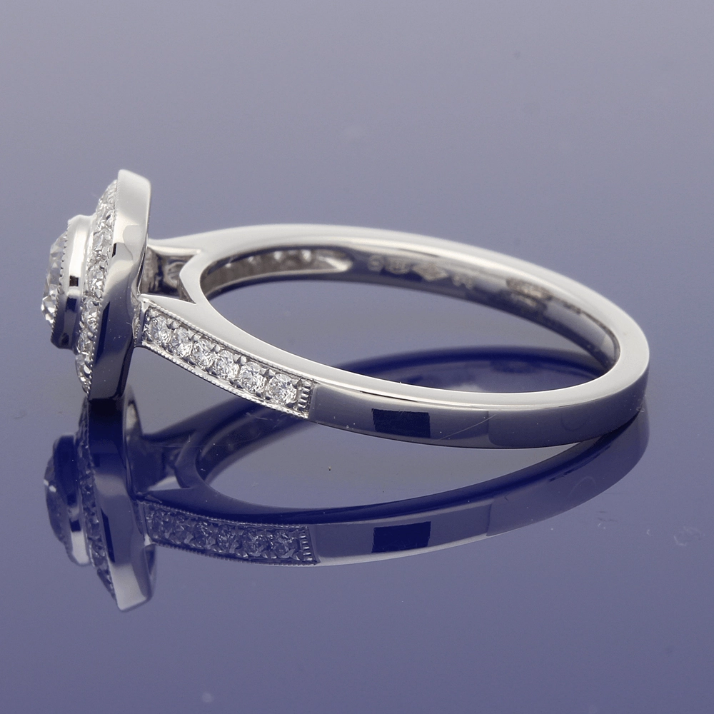 Platinum Diamond Halo Ring with Diamond Set Shoulders